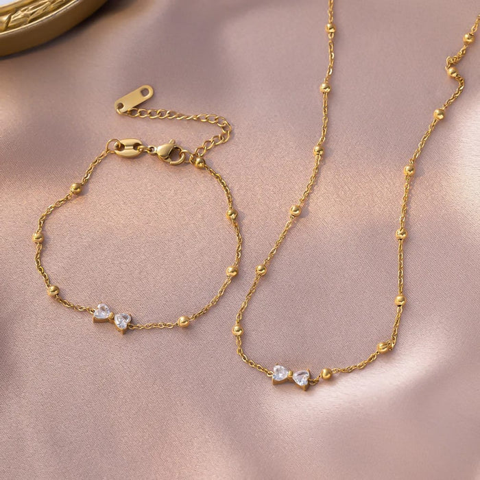 Elegant Golden Bow Necklace & Bracelet Set