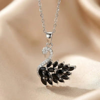 colour: black + silver chain